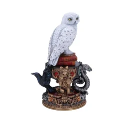 NEMESIS NOW Figurine Hedwige Les 4 Maisons De Poudlard - Harry Potter -Les 4 Maisons Boutique posture figurine hedwige embleme 4 maisons poudlard nemesis harry potter3